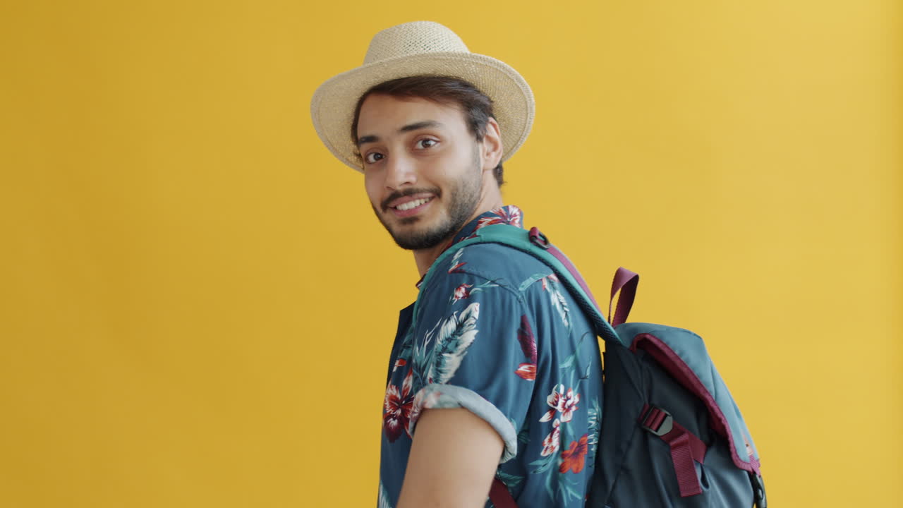 Man with a Backpack and a Hat