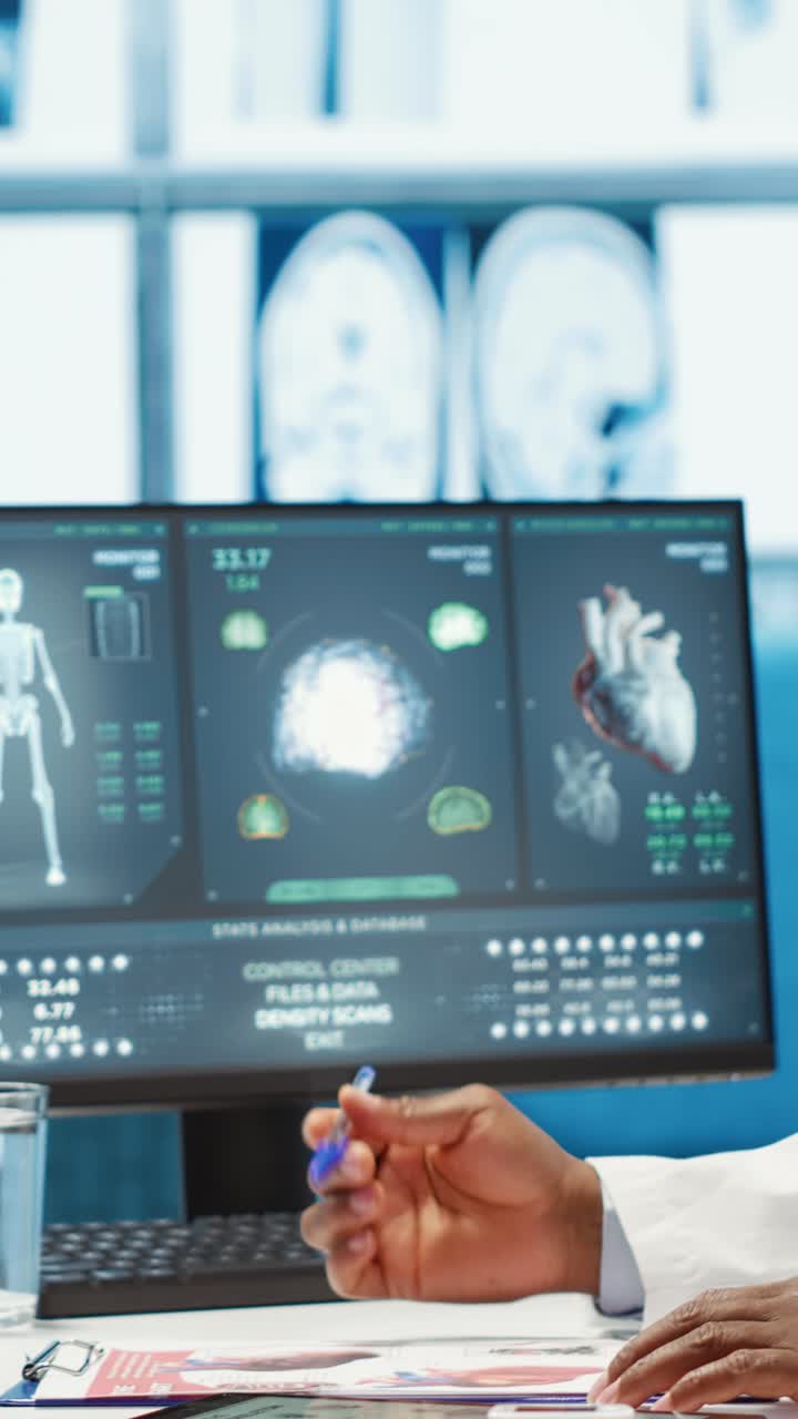 African American Doctor Analyzing Medical Scans on Computer | Premium ...