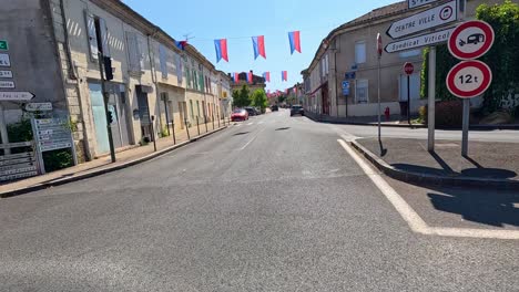 empty roads with flags in bordeaux, france