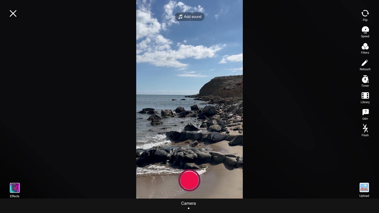 Scenic Coastal View of Rocky Beach on Sunny Day