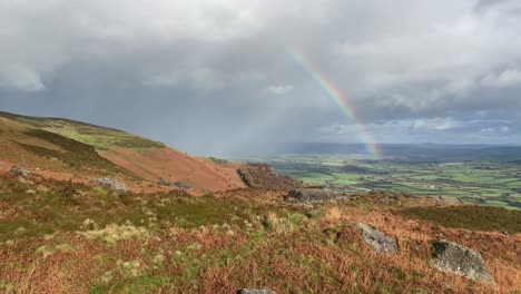 Mountain-rainbow-over-the-fertile-land-of-Waterford-Ireland-viewed-from-The-Comeragh-Moutains