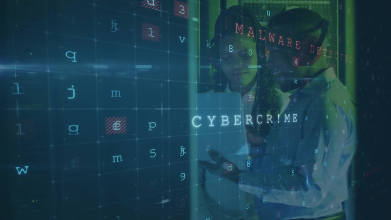 IT Professionals Monitoring Cybersecurity Threats in Server Room