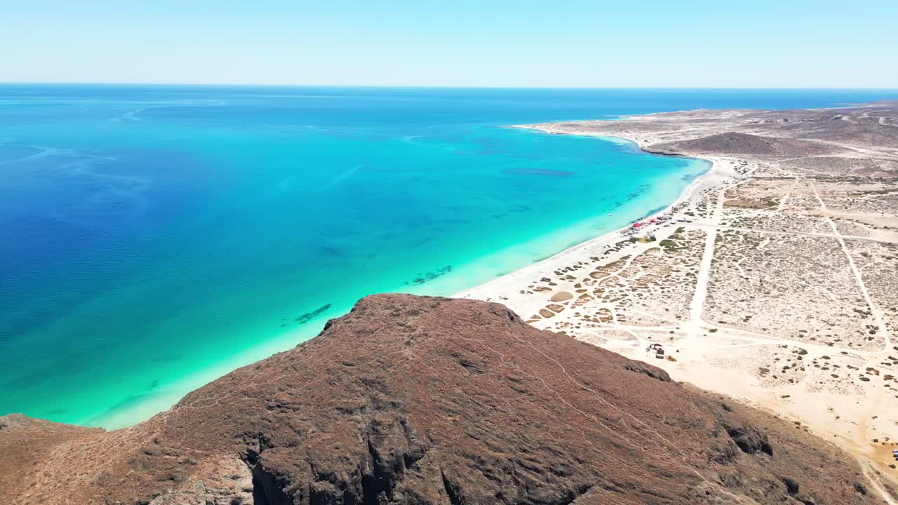 Tecolotito beach in la paz, showcasing clear turquoise water and sandy coastline, aerial view