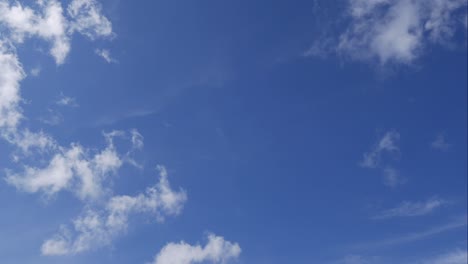 blue sky white clouds. puffy fluffy white clouds. cumulus cloud scape timelapse. summer blue sky time lapse. dramatic majestic amazing blue sky. soft white clouds form. clouds time lapse background