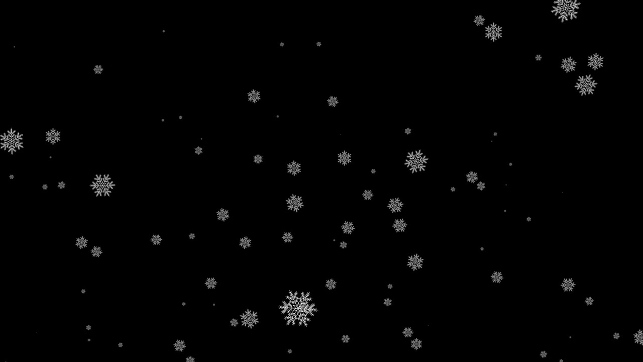 White Snowflakes Falling Against a Black Background