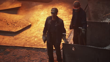 steel workers in a factory