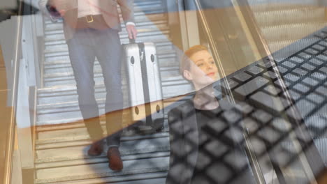 man and woman using escalator against person taking notes