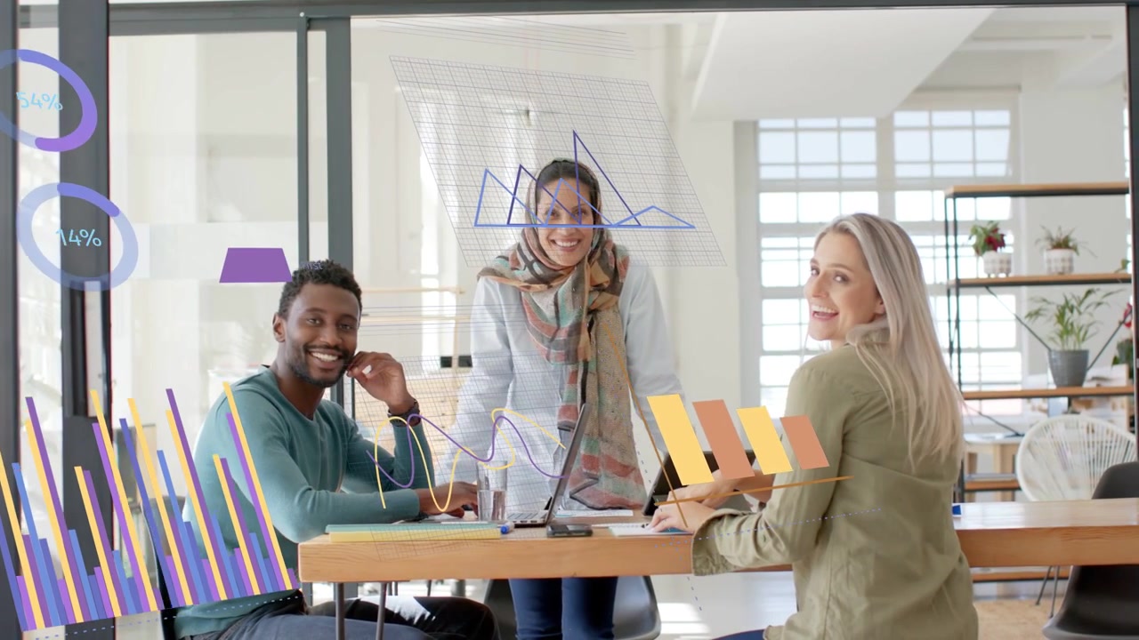 Standing team lead pointing at laptop causing business charts on glass wall for metrics review
