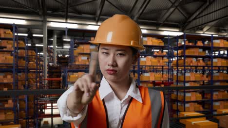 warehouse worker gesturing stop