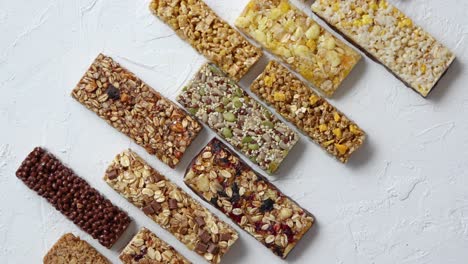 Row-of-mixed-gluten-free-granola-cereal-energy-bars--With-dried-fruits-and-nuts-