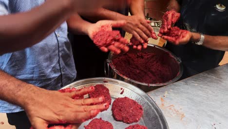 making sandwiches with a paste on with hands