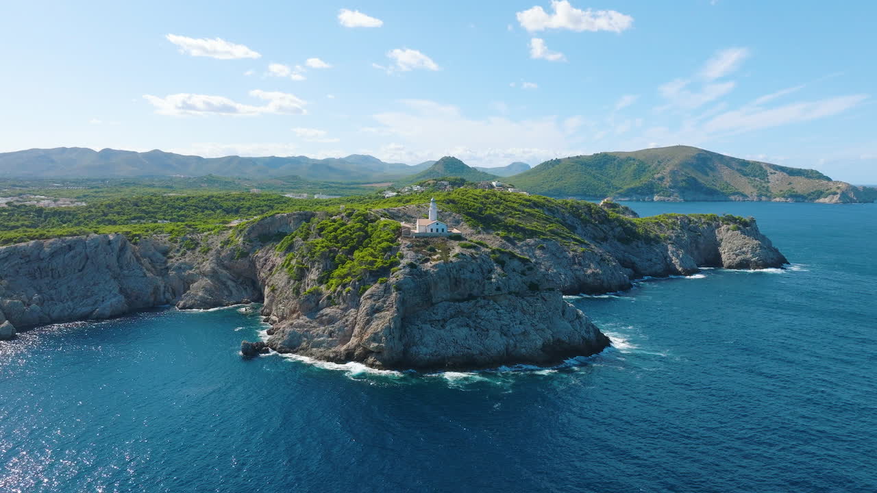 Aerial View of Lighthouse on Coastal Rocky Outcrop