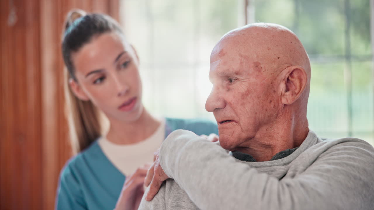 Physiotherapist, senior man and help for shoulder