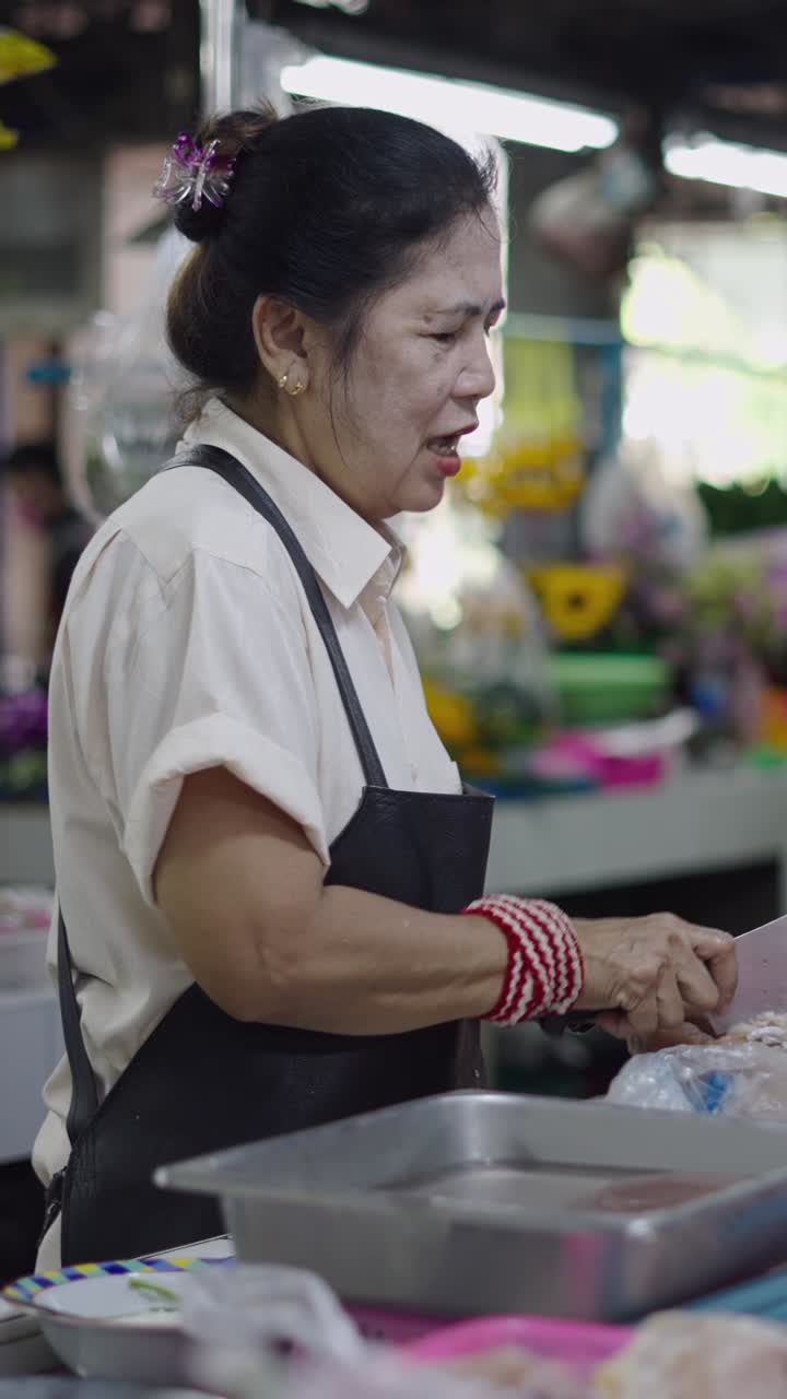 Woman selling food at the market