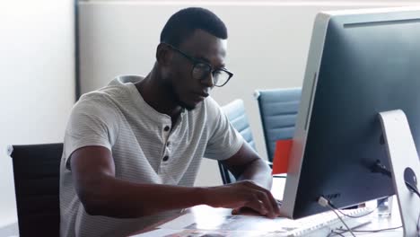 graphic designer working at desk