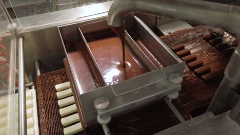 manufacturing of glazed sweet curd bars and wafer cones. glazed curds coating process