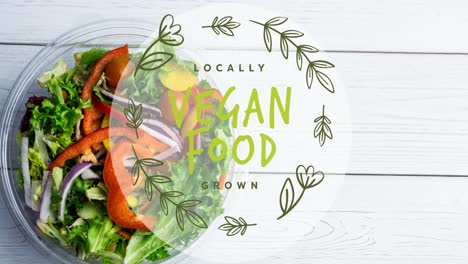 animación de alimentos veganos cultivados localmente texto en verde, sobre un tazón de ensalada fresca