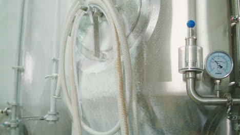 craft beer production, general cleaning on factory, brewery manufacture. washing metal vats bottles. brewing, cooking alcohol