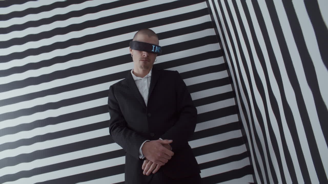 Man in Blindfold with Digital Display