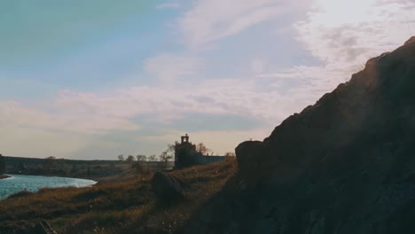 scenic landscape with ruins by a river