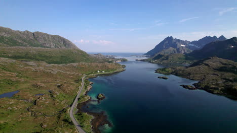 Aerial-Forwarding-shot-of-Lofoten-coastal-Road-on-a-sunny-summer-day