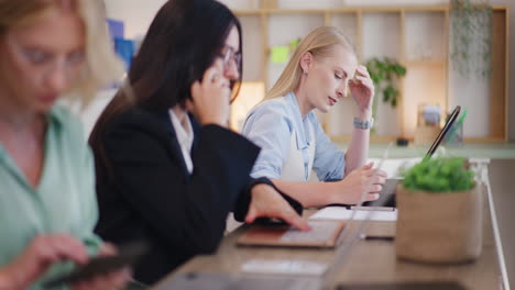 nervous corporate employee working on computer