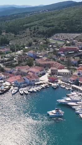 coastal village with marina, aerial view