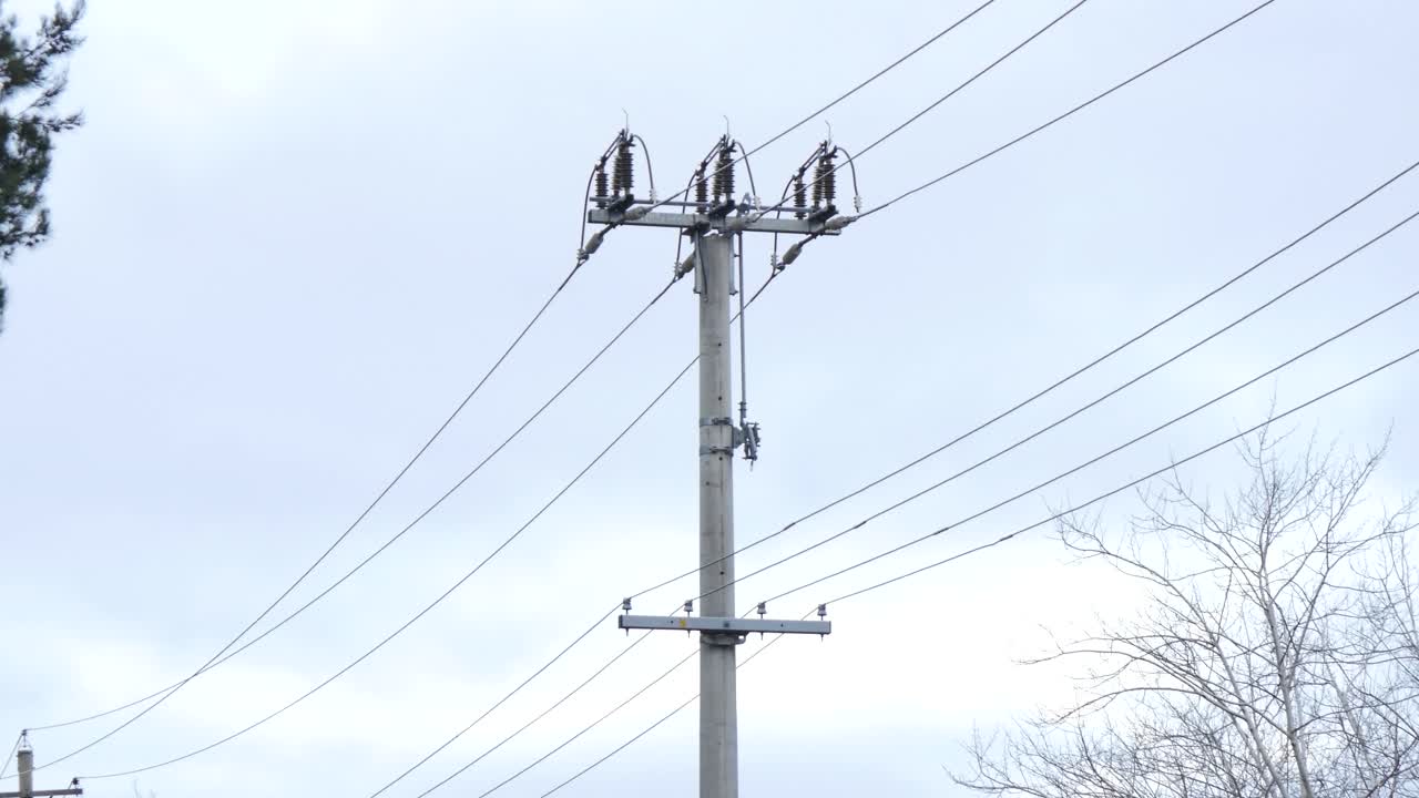 Powerline near the cloudy sky