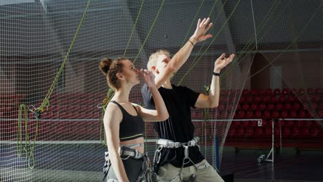 rock climbing instruction at indoor climbing gym