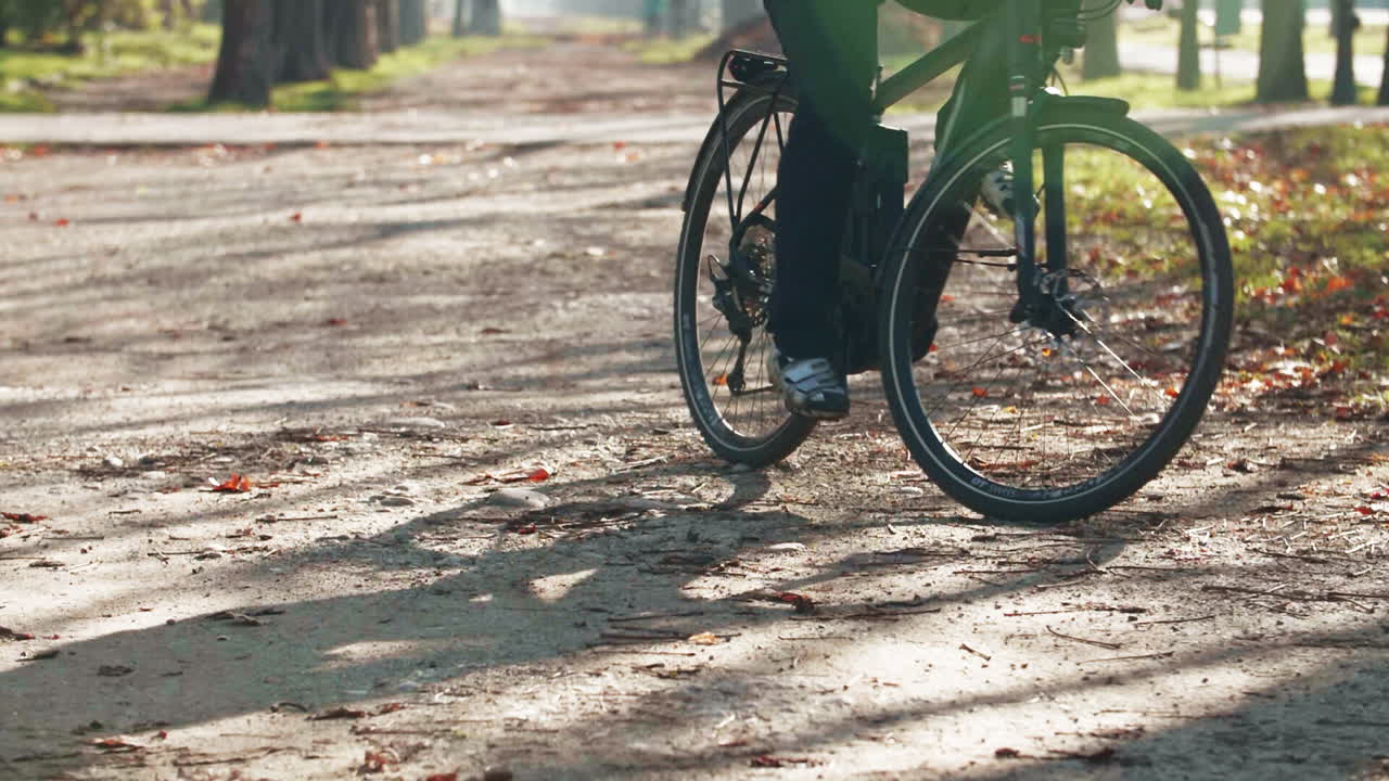 Man brakes with a bicycle, rear wheel lifts, almost falling