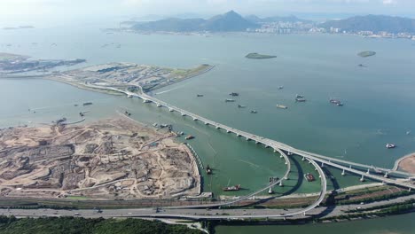 hong kong boundary crossing facilities and leading bridge and road system under construction, aerial view
