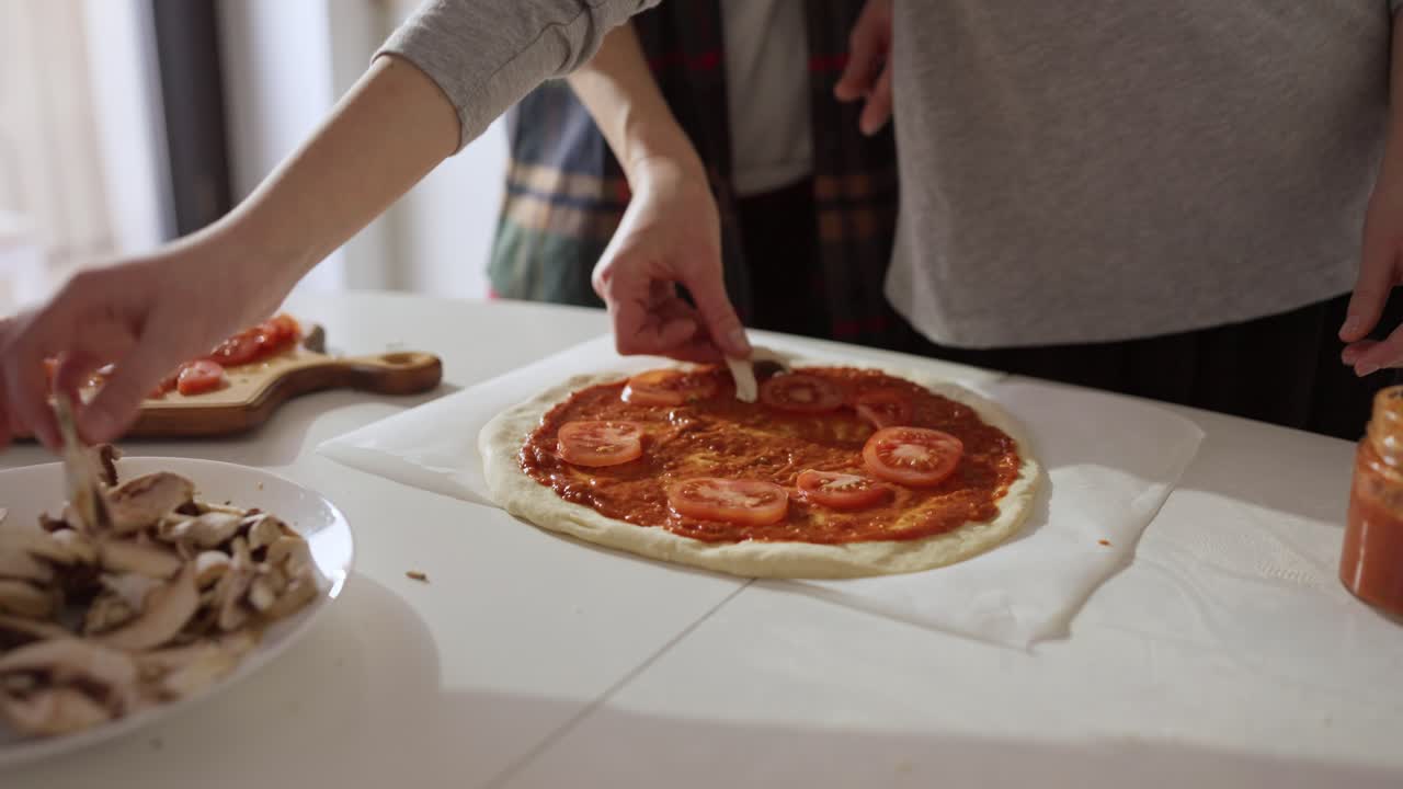 Making pizza with fresh ingredients