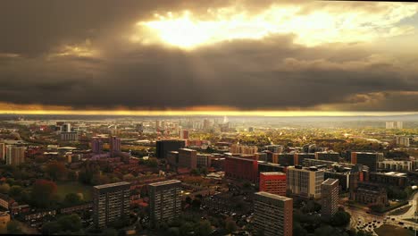 Aerial-drone-shot-rising-flying-over-typical-English-British-suburb-town,-Manchester