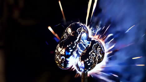 dynamic electrical sparks on a glowing metallic object