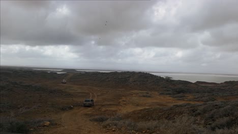 Off-Road-Driving-Trail-To-Coastal-Plain-in-la-guajira-desert-In-Colombia,-South-America---Wide-Shot