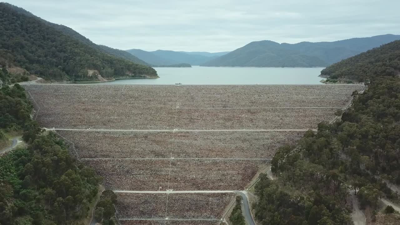 Rising aerial footage of the Dartmouth Power Station and Dartmouth Dam, Victoria, Australia. November 2021.