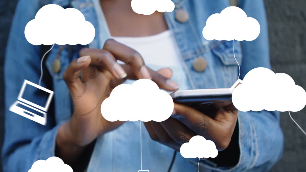 Animation of clouds with electronic devices over african american woman using smartphone