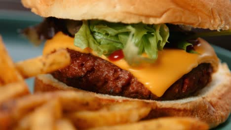 meat free cheese burger with brioche bun lettuce ketchup and french fries chips
