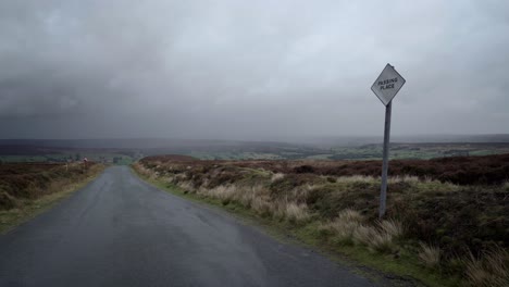 road sign indicating a passing place, on a single track road over the north york moors