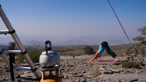 Western-traveler-girl-practicing-outdoor-yoga-in-Oman,-different-poses-in-other-clips-available