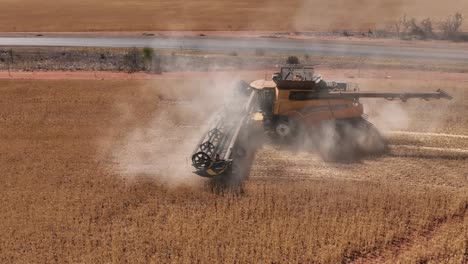 this footage captures the synergy of modern agricultural technology, showcasing the essential role of header fronts in the wheat harvesting process