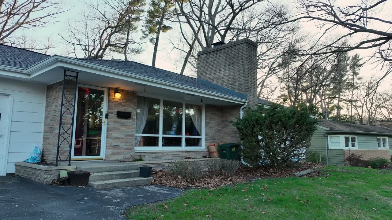 Aerial rise over small beach town.
