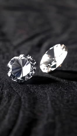 two diamonds on a dark background