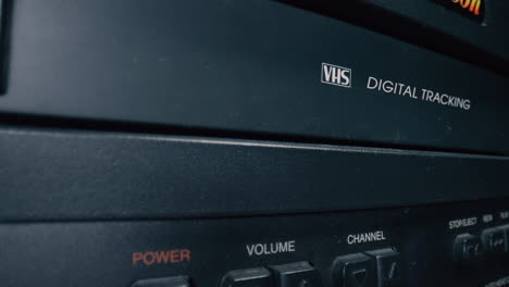 vhs tape pushed into vintage vcr