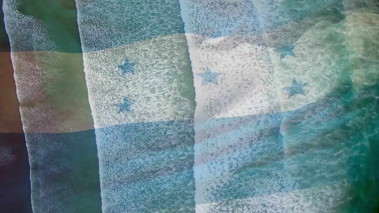 composición digital de la bandera de honduras ondeando contra la vista aérea de las olas del mar