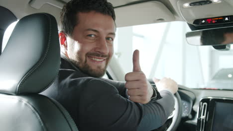 happy customer in a new car