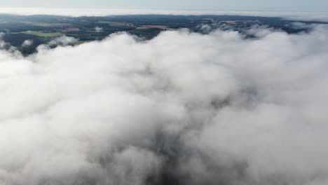 mist fog clouds from above aerial view over