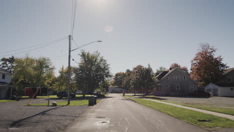 drive forward on a road through a typical american city