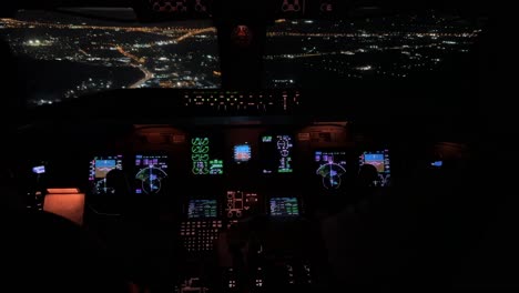 unique cockpit view during a real night approach to athens airport overflying the city