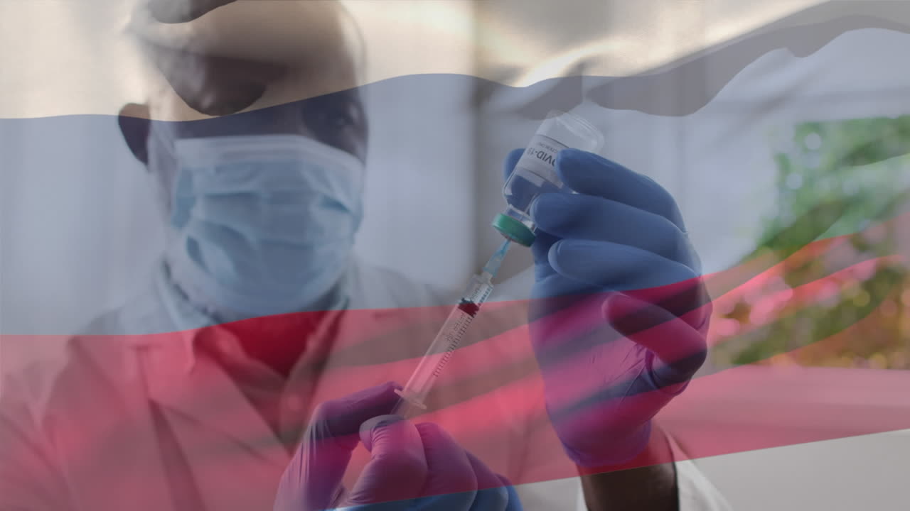 Animation of flag of russia waving over doctor wearing face mask and holding vaccine